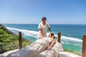 Image of A Girl Experiencing Body Massage in a Beach Resort