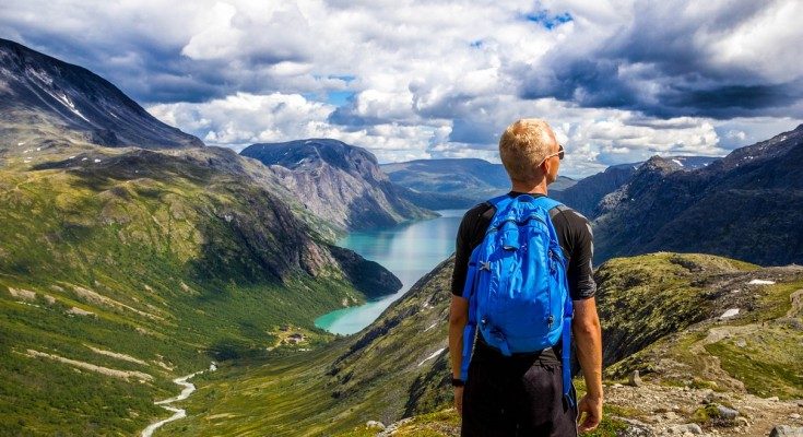 Image Showing A Person Starring At A Beautiful View of Mountains.