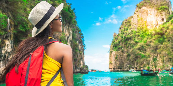 Image Of A Solo Woman Traveller Starring A Mountain.